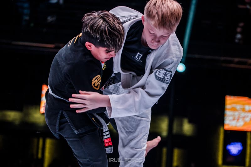 Kids gi competition action at JJWL