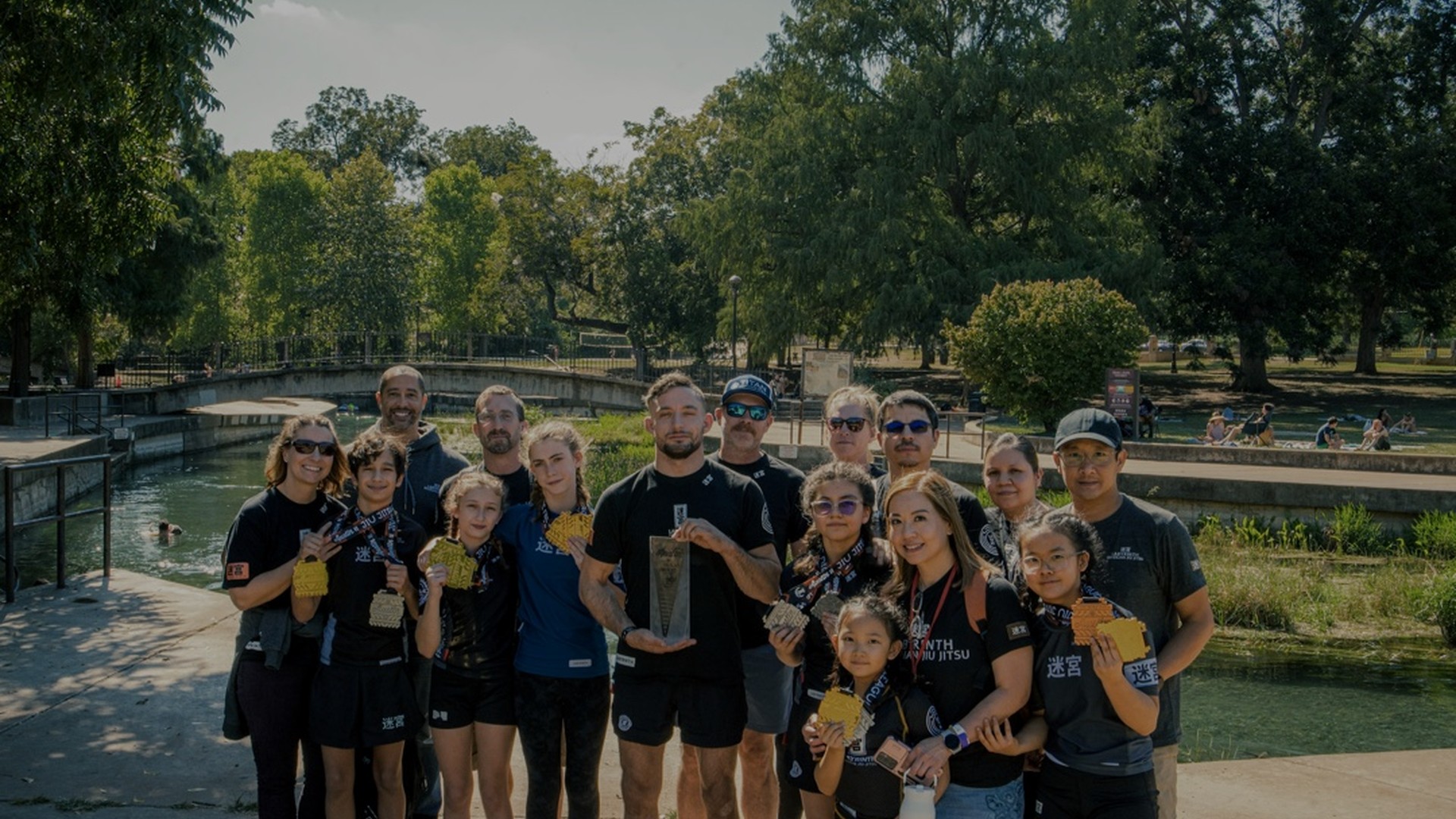 Labyrinth BJJ team celebrating with medals and trophies